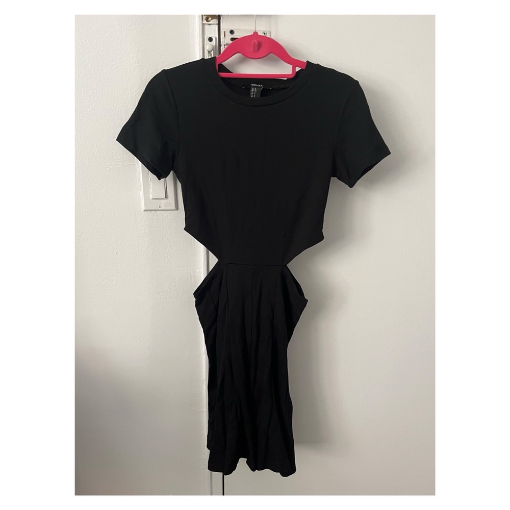 Forever 21 Black cut out dress with a short sleeve size small